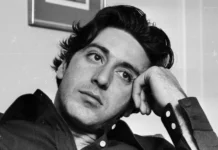 Anton James Pacino at a public event, standing beside family members, showcasing his unique presence.