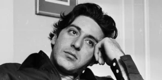 Anton James Pacino at a public event, standing beside family members, showcasing his unique presence.
