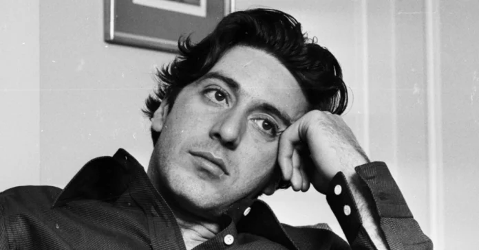Anton James Pacino at a public event, standing beside family members, showcasing his unique presence.