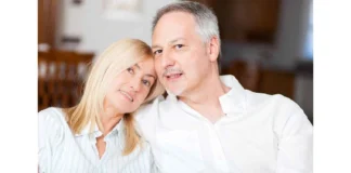 Bruce Wilpon and his wife sharing an intimate moment together in their home, displaying their private yet close relationship