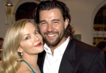 Carolin Bacic standing beside Steve Bacic, both smiling warmly at a public event.