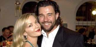 Carolin Bacic standing beside Steve Bacic, both smiling warmly at a public event.
