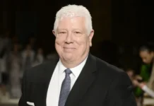 Dennis Basso at a fashion event, representing Dennis Basso Net Worth and luxury designer success.