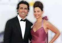 Eleanor Robb and Dario Franchitti at a formal event, both smiling in elegant attire showcasing their partnership as discussed in the article about Eleanor's career and personal life.