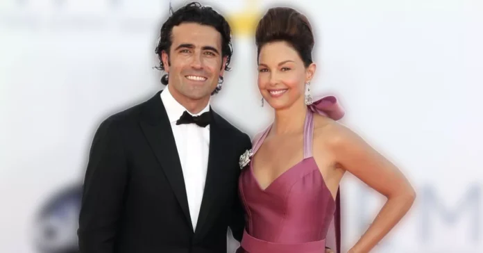 Eleanor Robb and Dario Franchitti at a formal event, both smiling in elegant attire showcasing their partnership as discussed in the article about Eleanor's career and personal life.