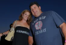 Kathy Giacalone, widow of NFL star Tony Siragusa, with their three children at foundation event.