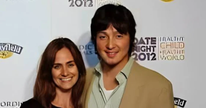 Seung Yong Chung, CEO of Cashmere Agency, stands confidently at a business event, representing leadership in multicultural marketing.