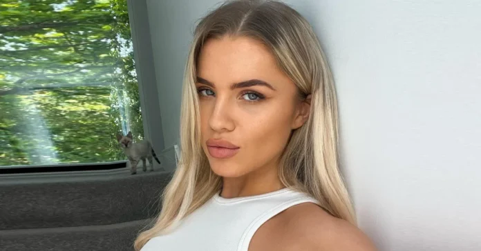 Daniella Hemsley confidently posing in athletic wear, showcasing her strength and charisma as a rising British boxer and social media influencer.