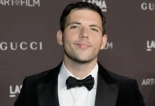 Portrait of Elan Ruspol, American talent agent and husband of Jacqueline MacInnes Wood, at a red carpet event showcasing his professional and personal presence.
