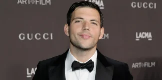 Portrait of Elan Ruspol, American talent agent and husband of Jacqueline MacInnes Wood, at a red carpet event showcasing his professional and personal presence.