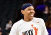 Emma Cannon in action on the basketball court, showcasing her skills and determination during a professional WNBA game.