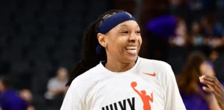 Emma Cannon in action on the basketball court, showcasing her skills and determination during a professional WNBA game.