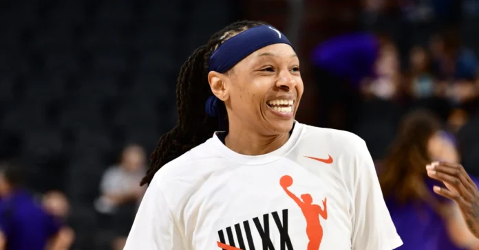 Emma Cannon in action on the basketball court, showcasing her skills and determination during a professional WNBA game.