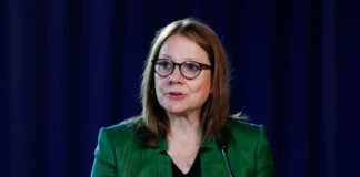Mary Barra Net Worth success - GM CEO Mary Barra in professional business attire representing automotive leadership wealth.