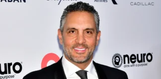 Mauricio Umansky Net Worth: Luxury real estate mogul Mauricio Umansky smiling at a high-profile Beverly Hills property event.