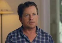 Michael J Fox net worth actor in plaid shirt interview discussing career earnings