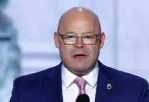 Sean O'Brien Teamsters president speaking at podium about union leadership and net worth