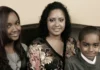 Laurie Holmond with her children in a family portrait, showcasing her role as a dedicated mother and private figure