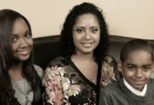 Laurie Holmond with her children in a family portrait, showcasing her role as a dedicated mother and private figure