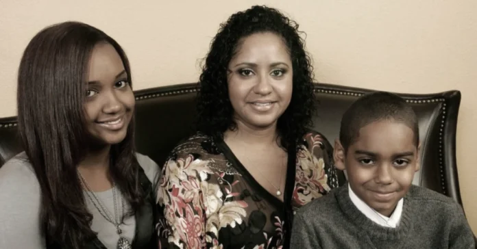 Laurie Holmond with her children in a family portrait, showcasing her role as a dedicated mother and private figure