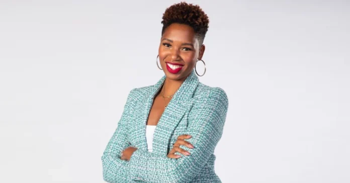 Portrait of Monica McNutt, basketball analyst and media personality, confidently presenting insights on sports with a professional backdrop.